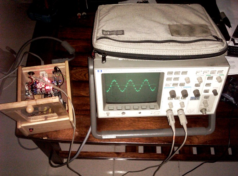 i2s monica beside vintage oscilloscope